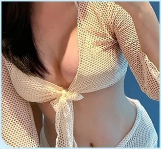 After breast surgery, wearing a sheer cover-up