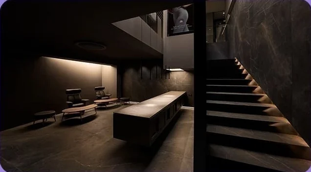 1F Breast Welcome Center — dark-toned lounge and stairs