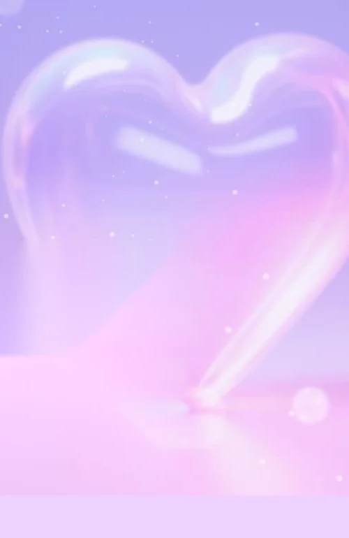 A translucent heart-shaped balloon with a soft glow