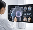 Medical staff reviewing a 3D simulation screen