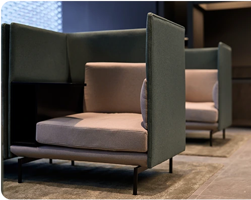 High-back booth sofas in the private lounge